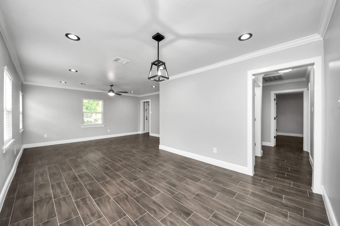 135 Rustic Drive Pasadena, TX 77502 - Photo 14 of 31 wooden floor in an empty room with a window