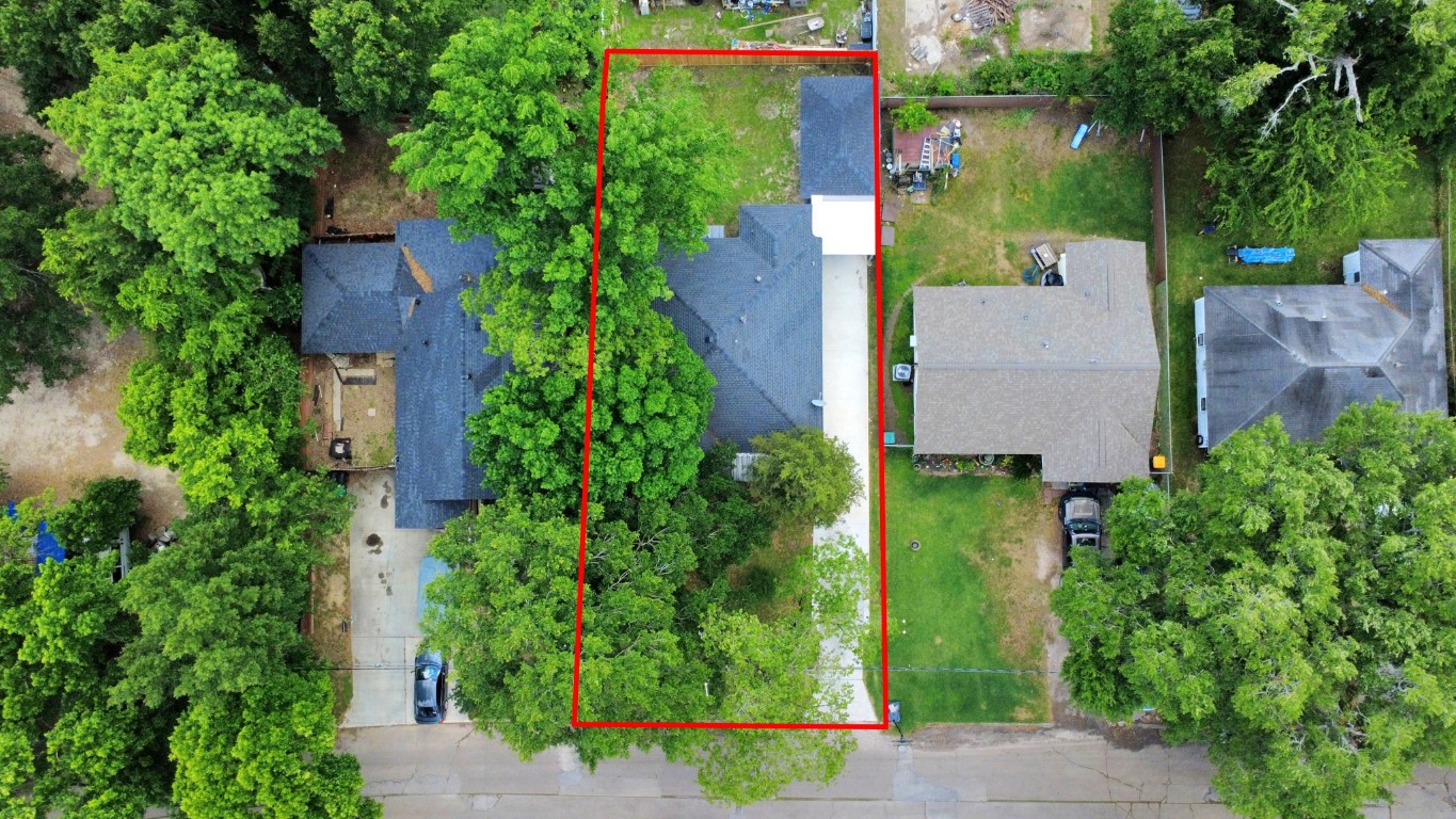 135 Rustic Drive Pasadena, TX 77502 - Photo 31 of 31 an aerial view of a house with outdoor space and lake view