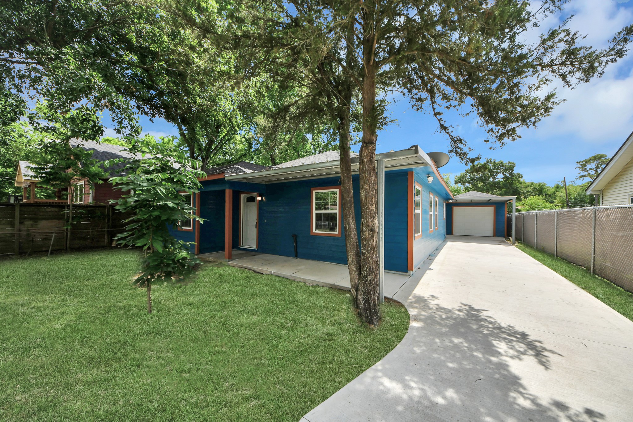 135 Rustic Drive Pasadena, TX 77502 - Photo 4 of 31 a house view with a garden space