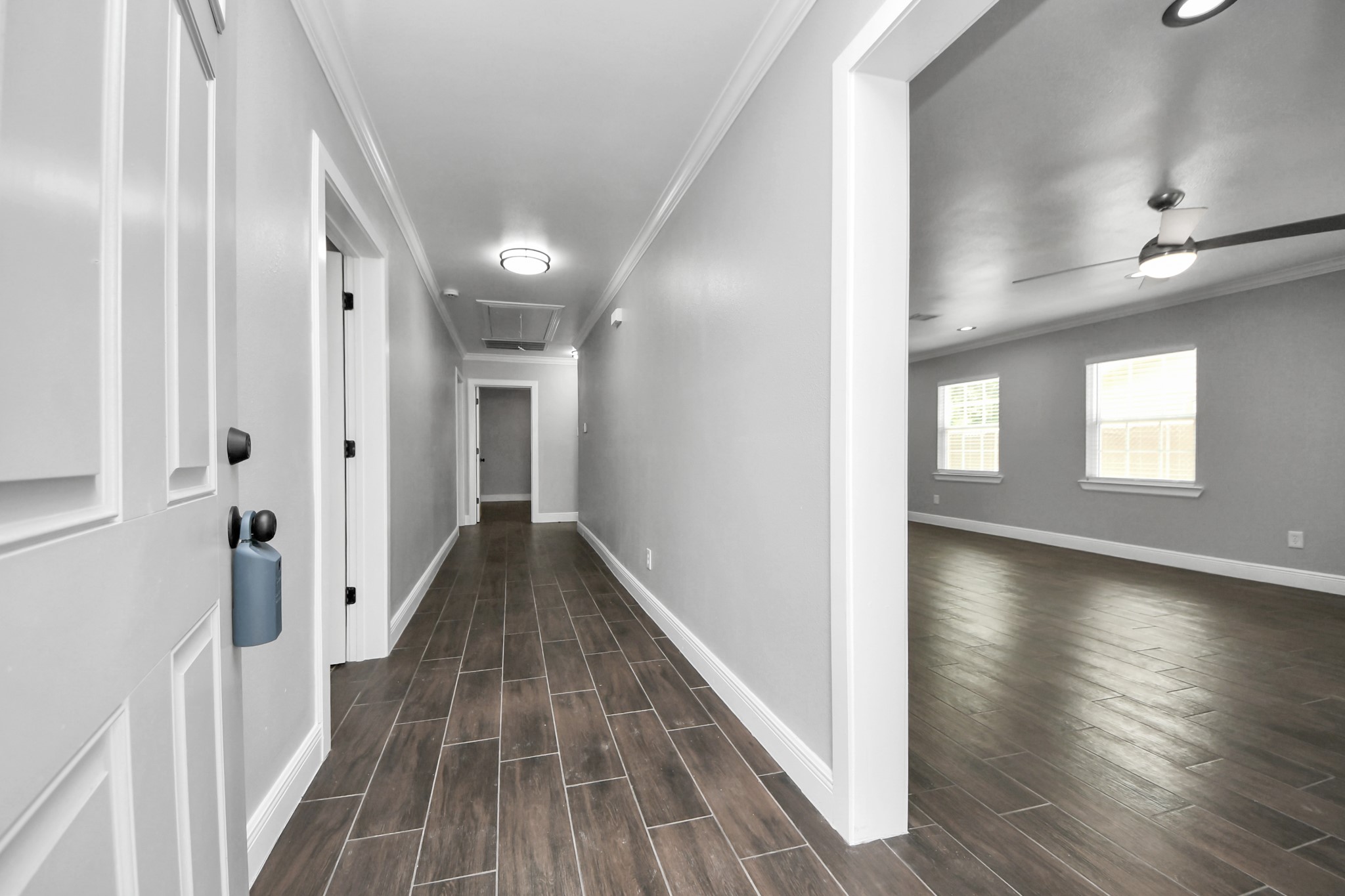 135 Rustic Drive Pasadena, TX 77502 - Photo 8 of 31 a view of a hallway with wooden floor and staircase