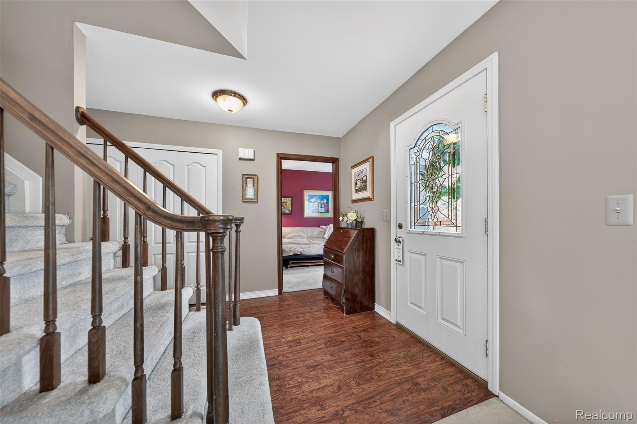 2578 Powderhorn Ridge Road Rochester, MI 48309 - Photo 4 of 46 Entryway with stairway and dark wood-type flooring