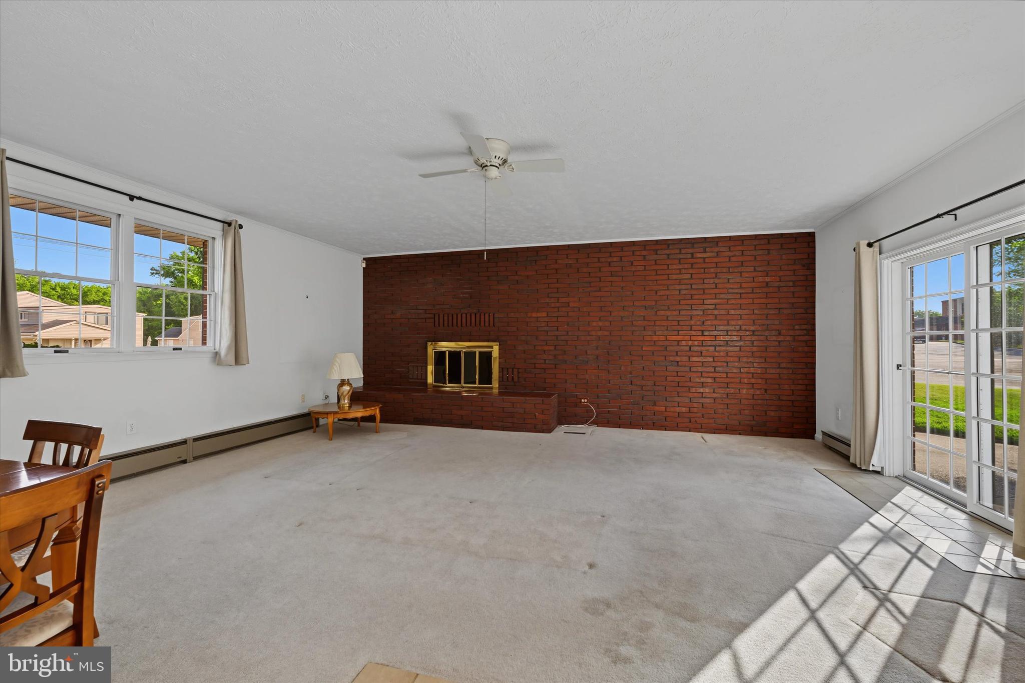 9939 Bird River Road Baltimore, MD 21220 - Photo 11 of 45 Large family room is flooded with light