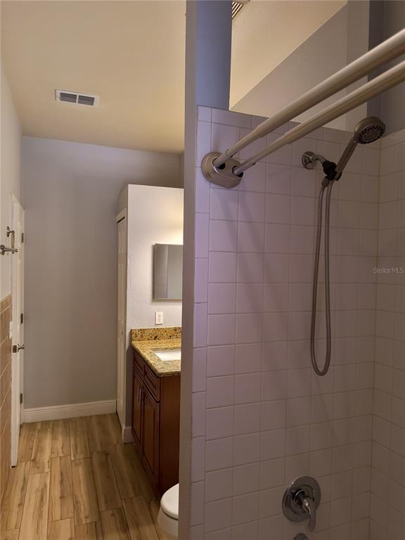3201 Settlers Trail St. Cloud, FL 34772 - Photo 19 of 38 a bathroom with a granite countertop shower