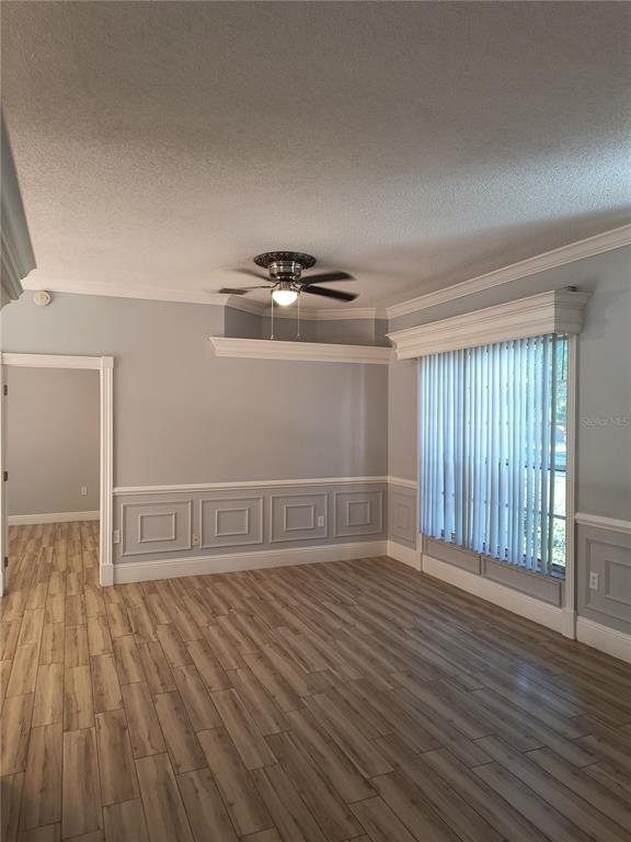 3201 Settlers Trail St. Cloud, FL 34772 - Photo 24 of 38 a view of an empty room with wooden floor