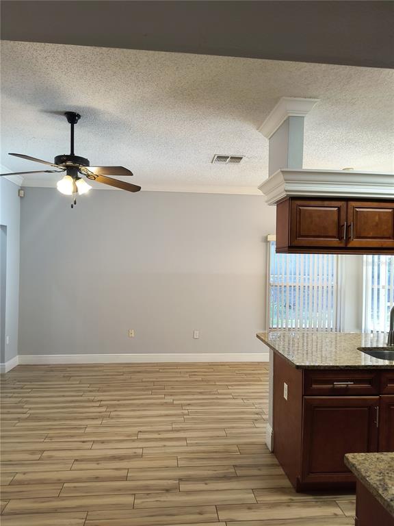 3201 Settlers Trail St. Cloud, FL 34772 - Photo 32 of 38 a room with a table and chairs