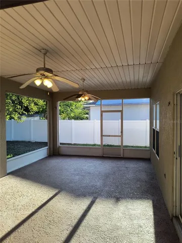 a view of backyard with a small cabin