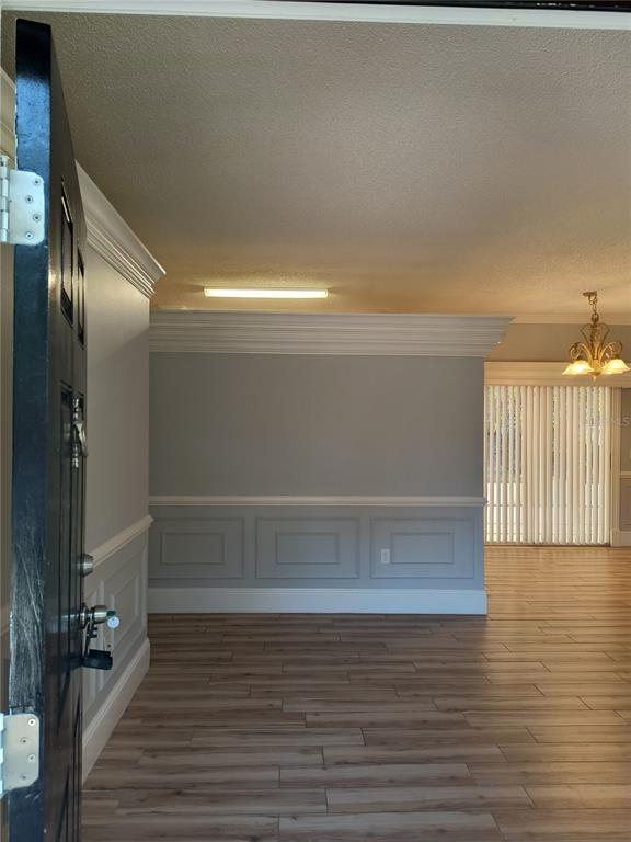3201 Settlers Trail St. Cloud, FL 34772 - Photo 10 of 38 a view of empty room with wooden floor