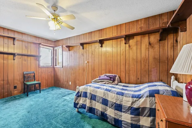 a bathroom with a double vanity sink mirror and