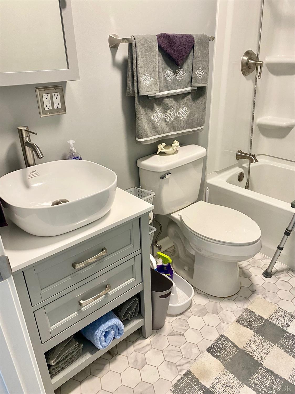 3501 Fort Avenue, Unit 29 Lynchburg, VA 24501 - Photo 13 of 16 a bathroom with a toilet and a sink