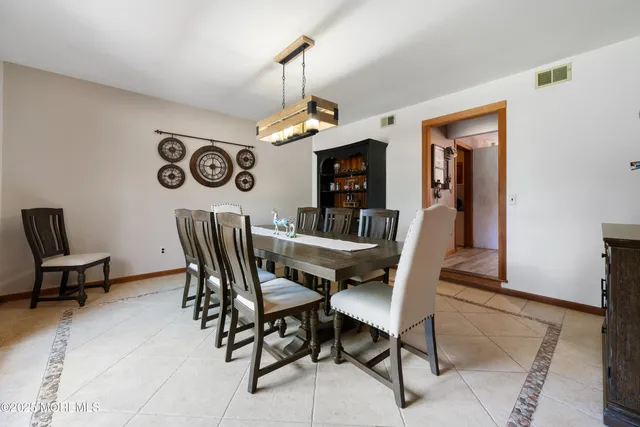 a view of a dining room and livingroom