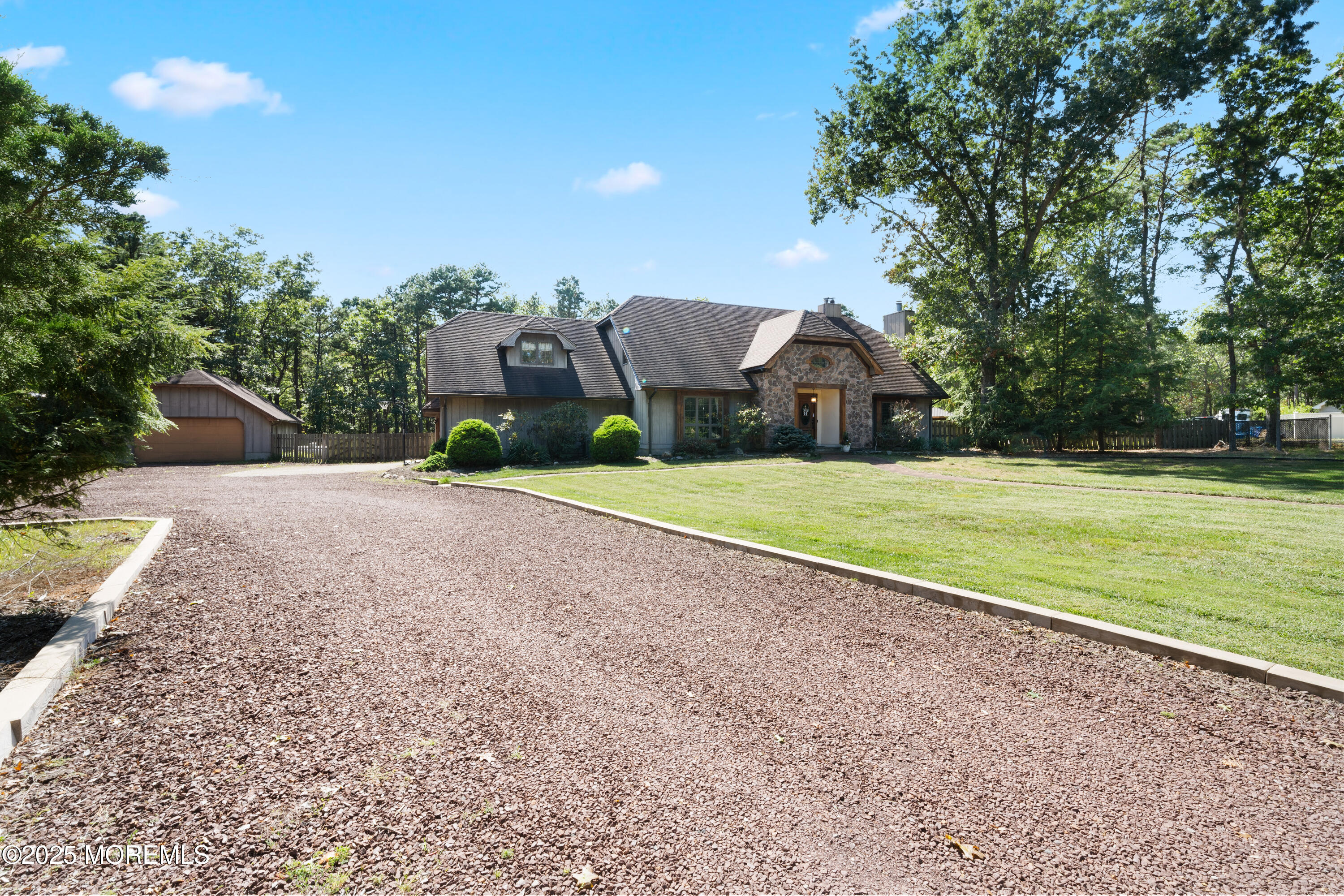 1226 Andover Road Forked River, NJ 08731 - Photo 2 of 44 a view of a house with a yard and large trees