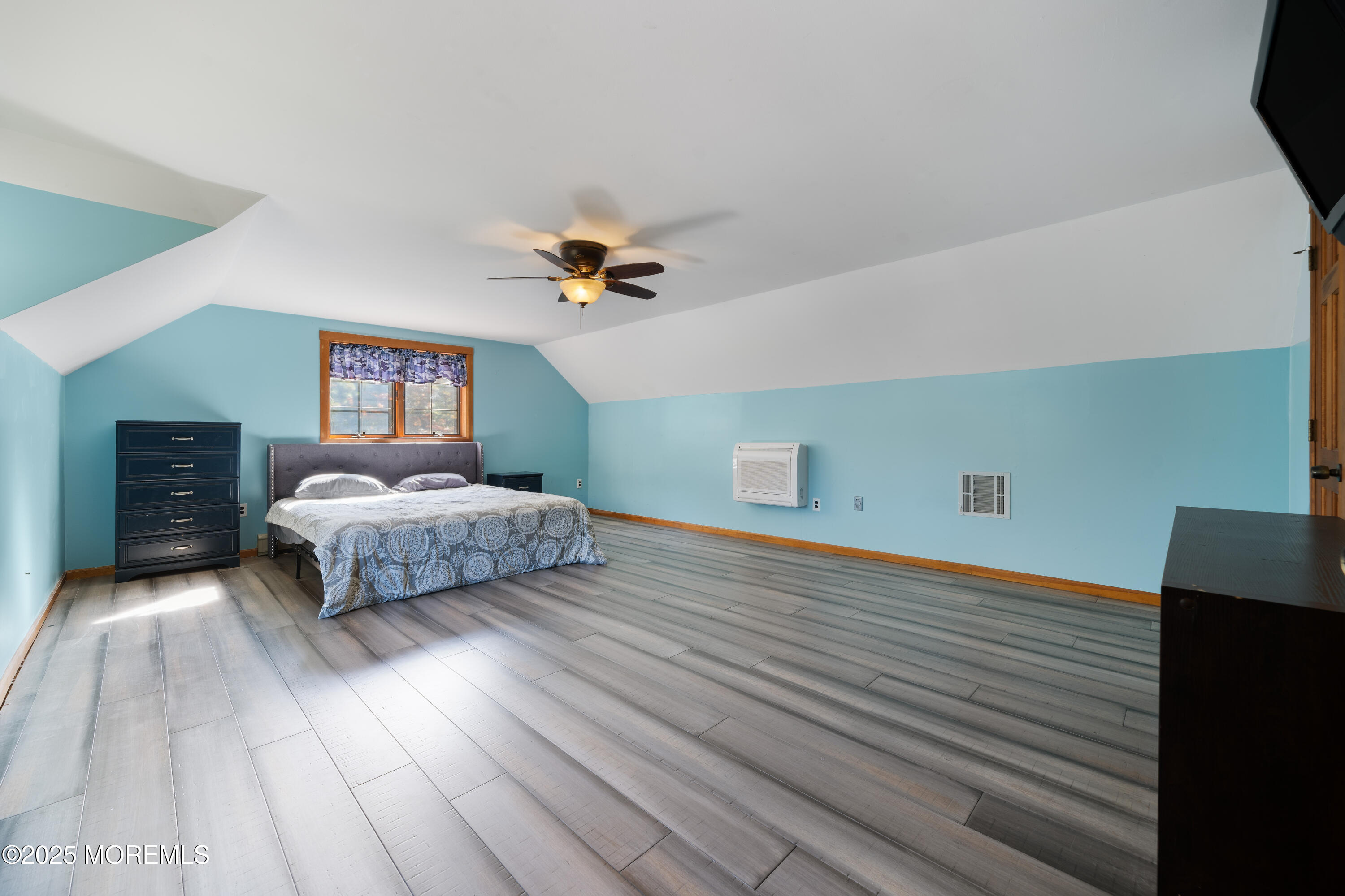 1226 Andover Road Forked River, NJ 08731 - Photo 27 of 44 a bedroom with a bed and a night stand
