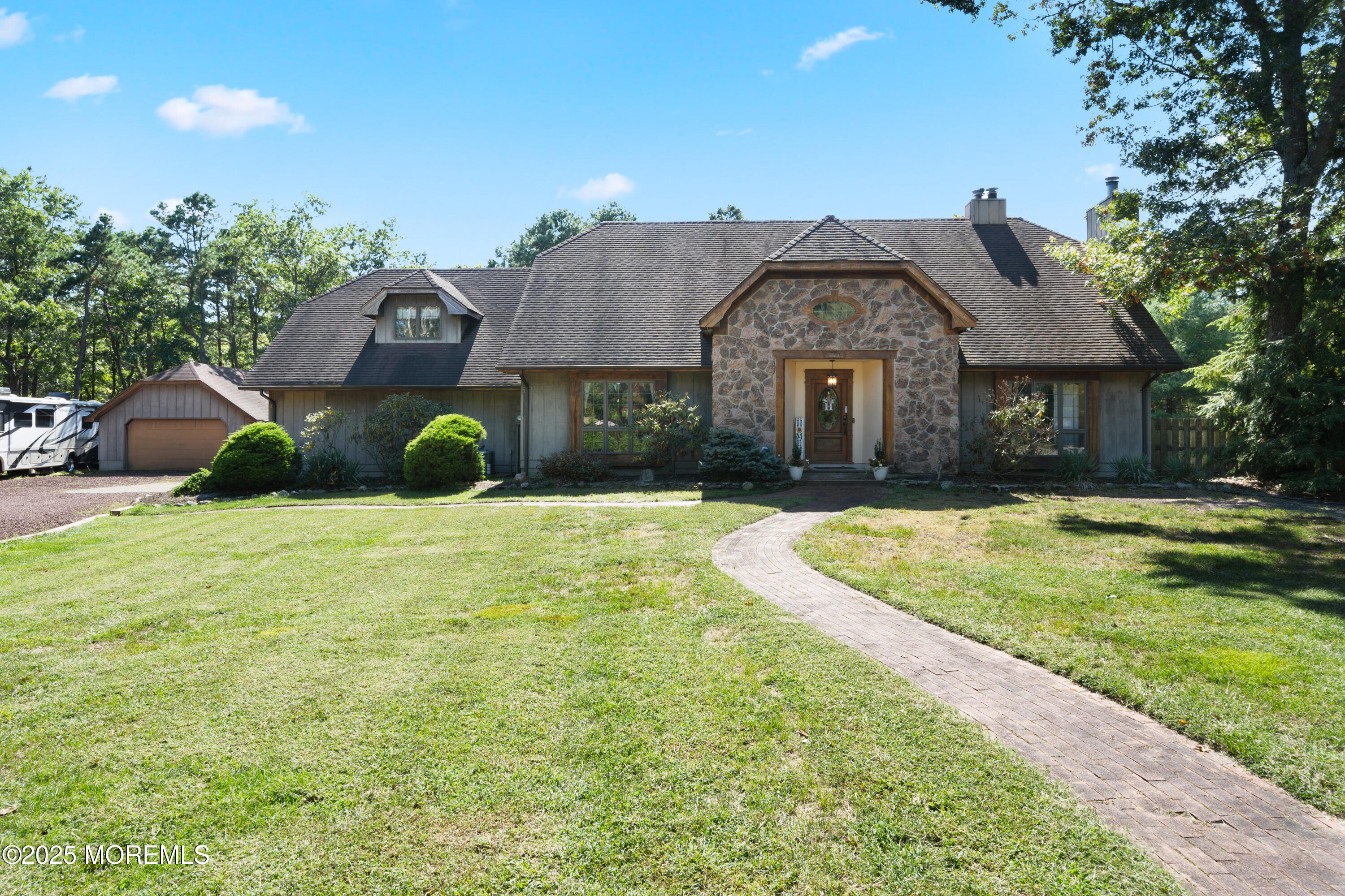 1226 Andover Road Forked River, NJ 08731 - Photo 3 of 44 a front view of a house with a yard