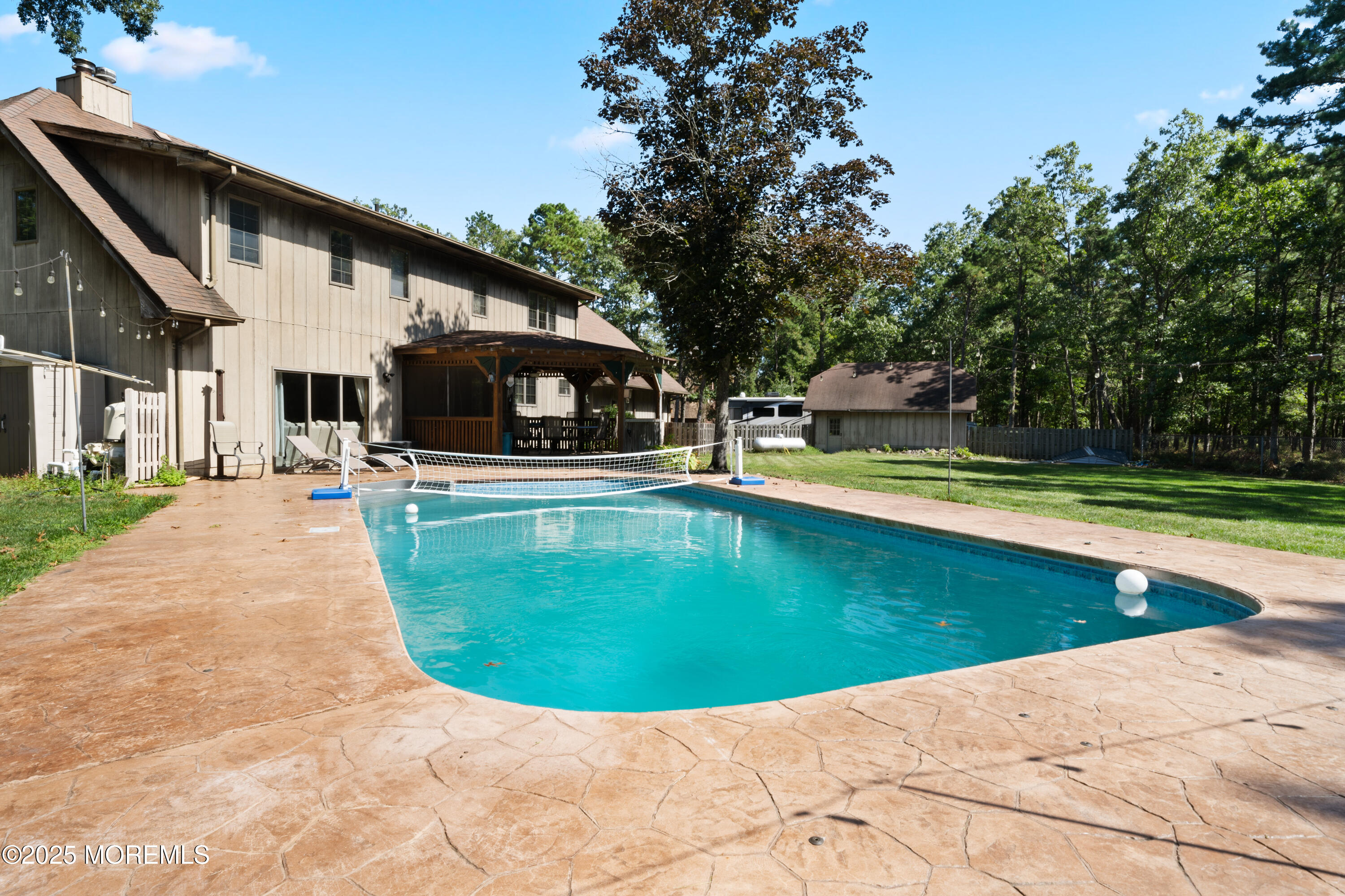 1226 Andover Road Forked River, NJ 08731 - Photo 33 of 44 a view of a house with swimming pool