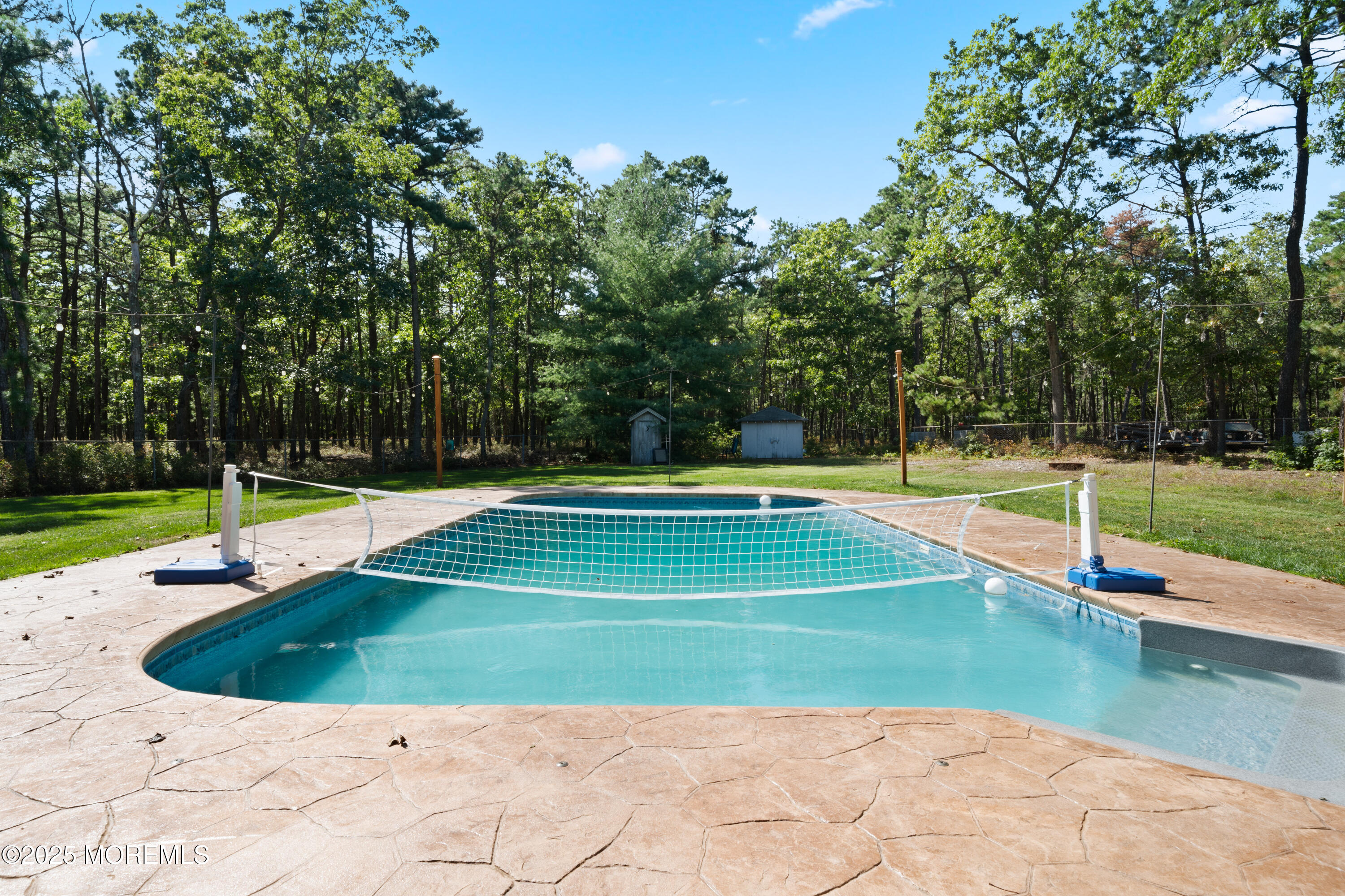 1226 Andover Road Forked River, NJ 08731 - Photo 34 of 44 a view of a swimming pool with a yard