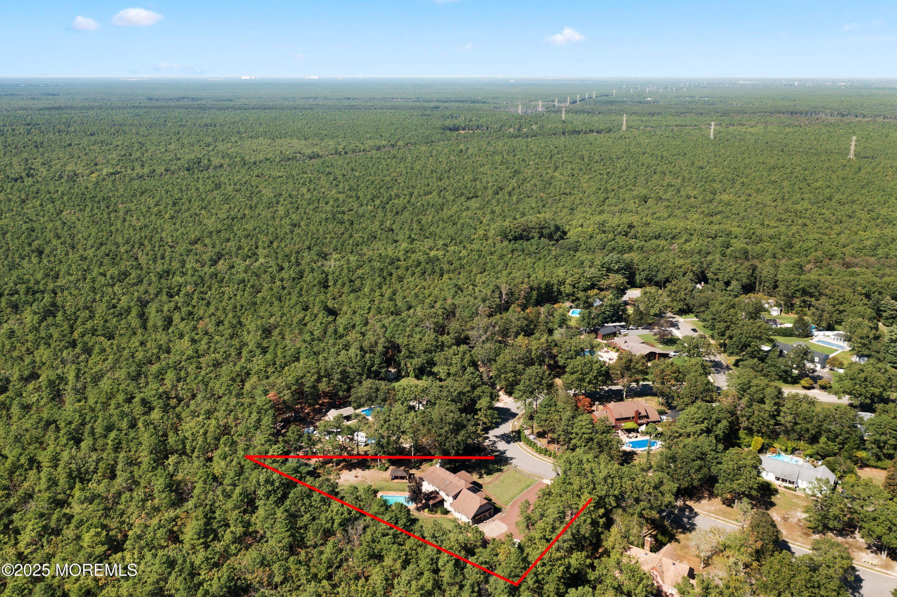 1226 Andover Road Forked River, NJ 08731 - Photo 42 of 44 a view of a green field with lots of bushes
