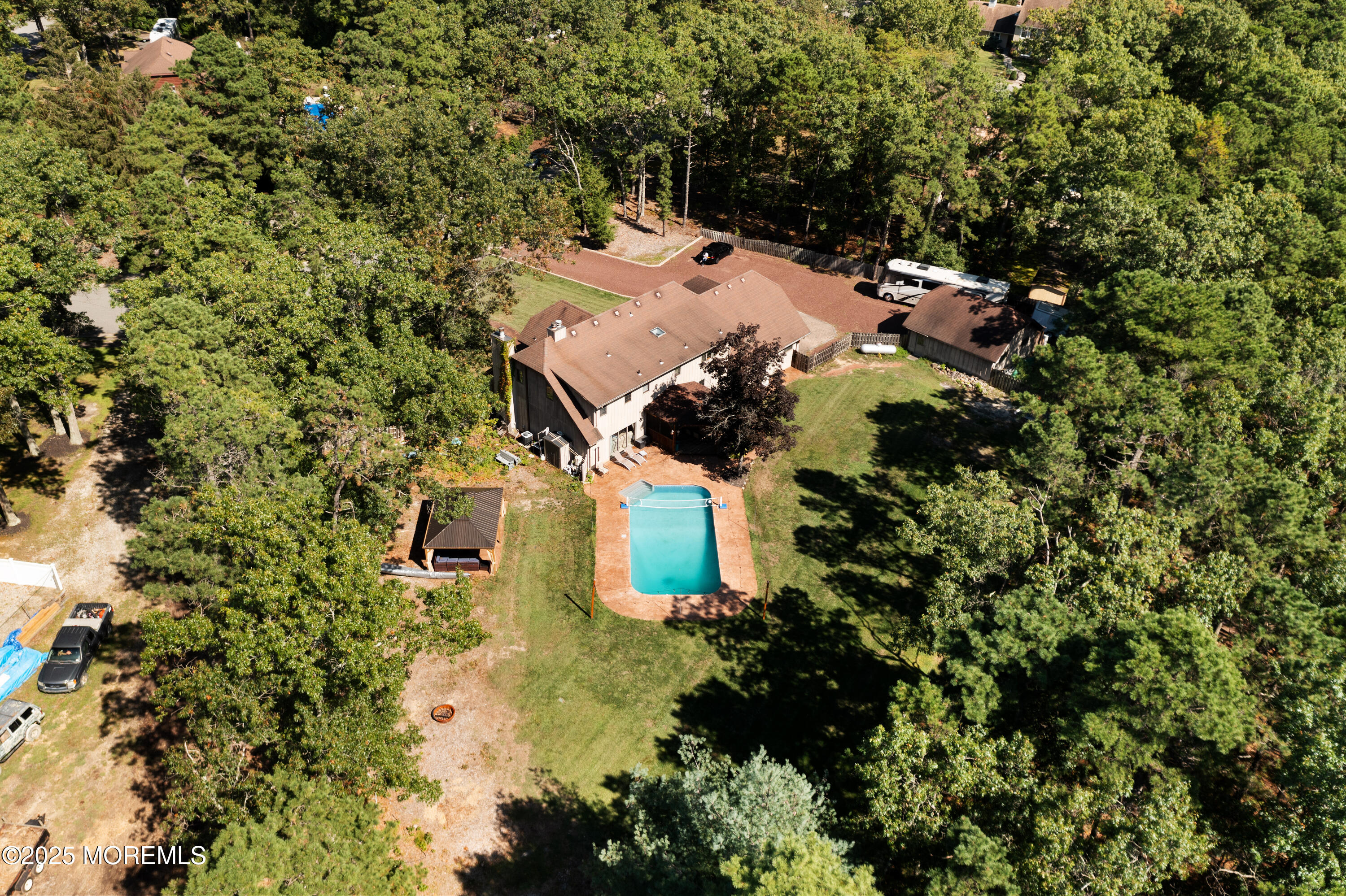 1226 Andover Road Forked River, NJ 08731 - Photo 44 of 44 an aerial view of a house with a yard and trees