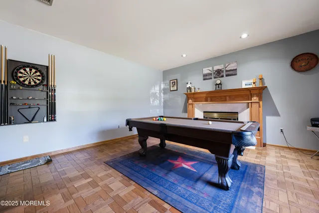 a room with furniture and wooden floor