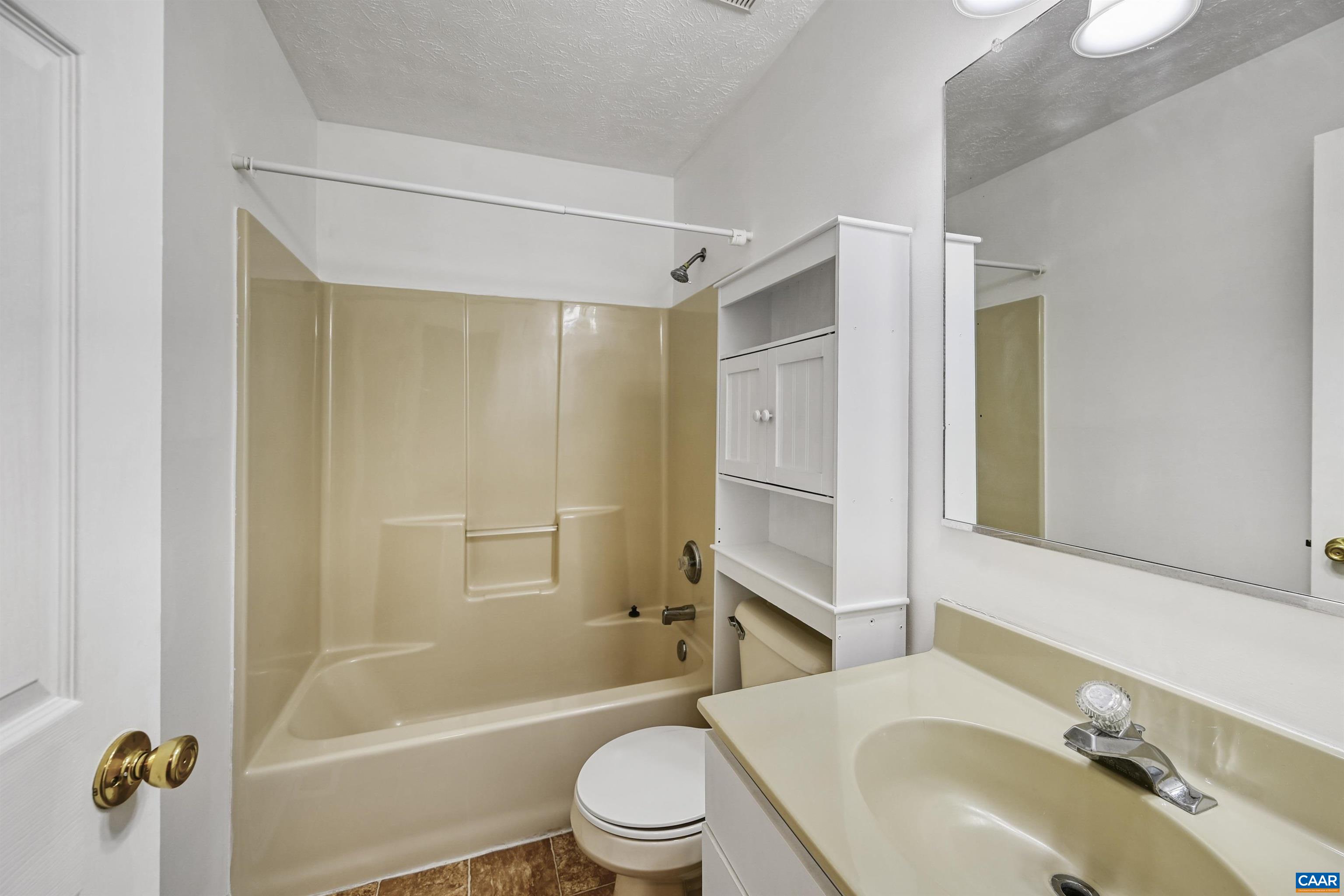 2445 Eastham Road Bumpass, VA 23024 - Photo 25 of 29 a bathroom with a sink toilet and shower