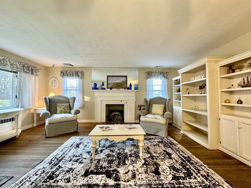 53 Dellwood Road Worcester, MA 01602 - Photo 16 of 24 a living room with furniture and a fireplace