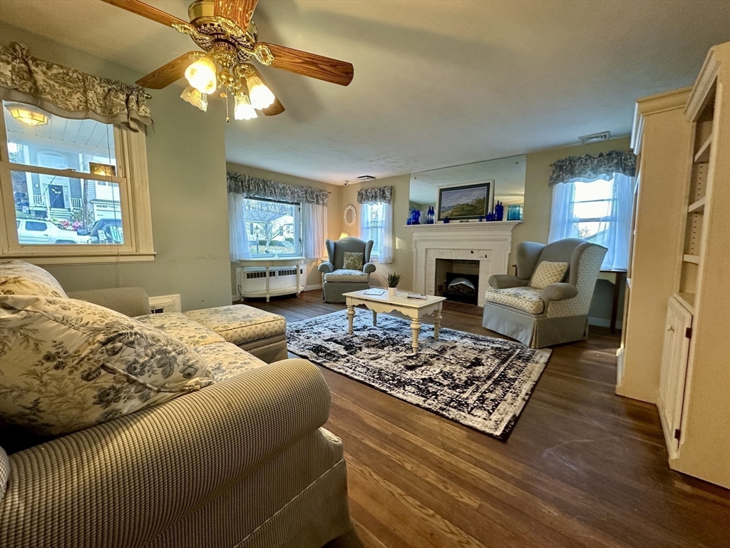 53 Dellwood Road Worcester, MA 01602 - Photo 7 of 24 a living room with furniture and a fireplace