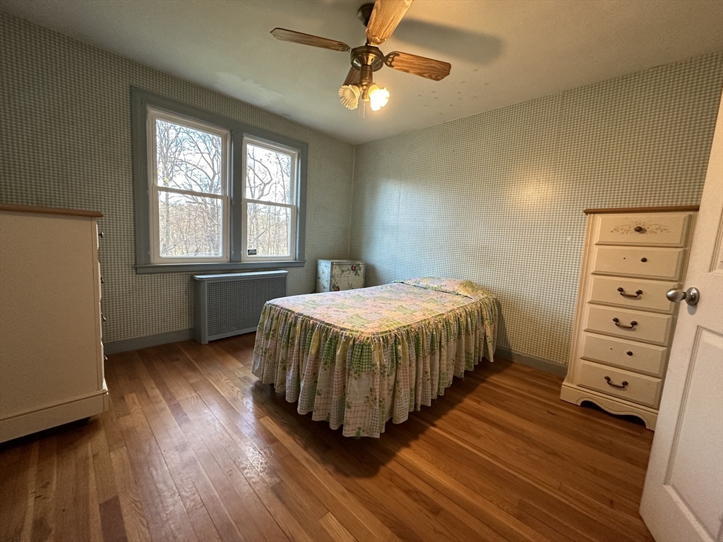 53 Dellwood Road Worcester, MA 01602 - Photo 10 of 24 a bedroom with a bed and a window