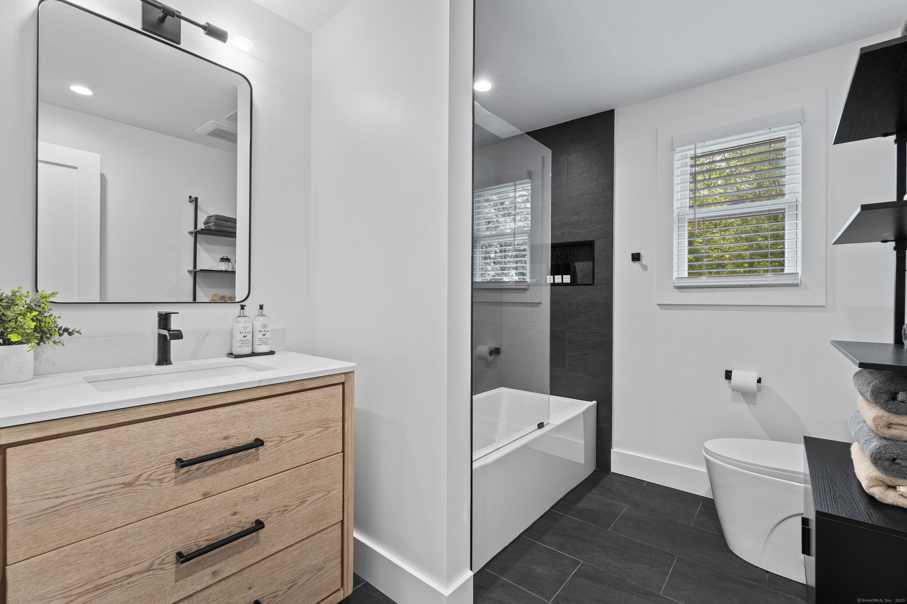 69 Squires Road Madison, CT 06443 - Photo 30 of 40 Fully renovated hall bath.