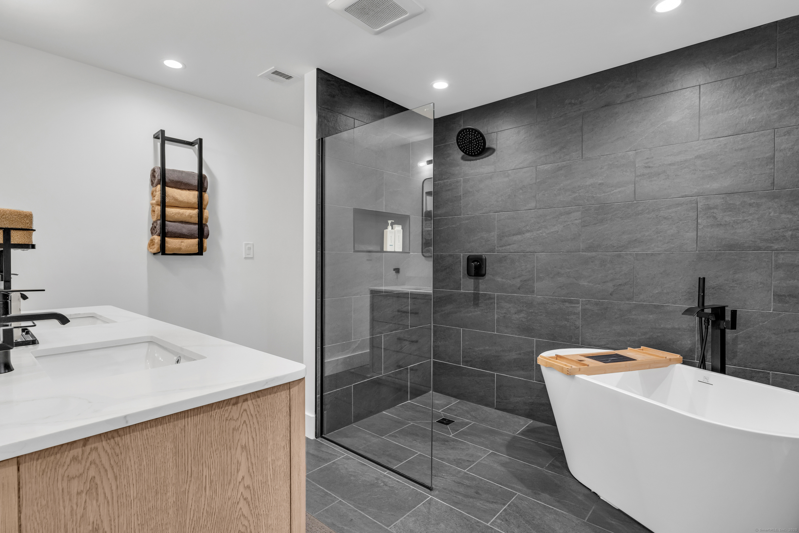 69 Squires Road Madison, CT 06443 - Photo 8 of 40 The most luxurious primary bath with walk-in shower and soaking tub and heated floors!
