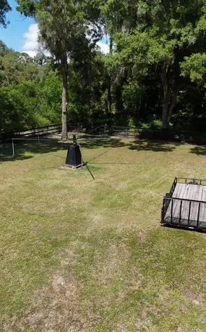 a view of swimming pool with seating space