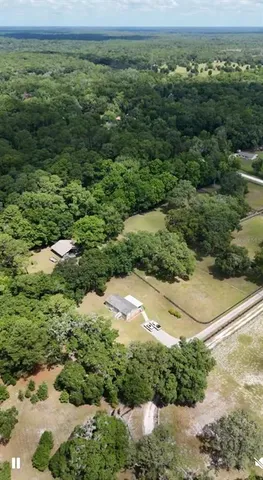 a view of a yard with a street
