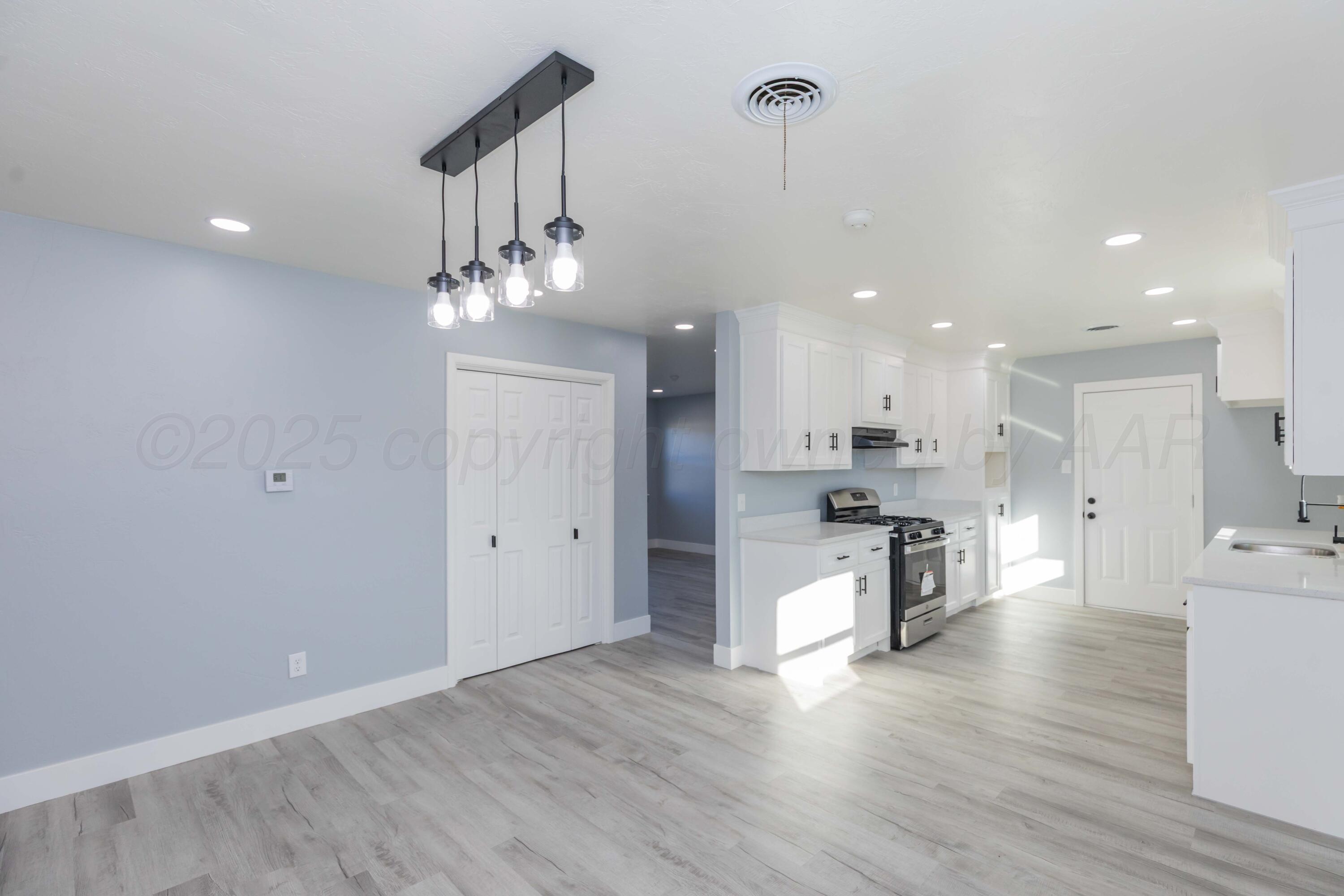3108 Oak Drive Amarillo, TX 79107 - Photo 12 of 35 a view of kitchen with sink and refrigerator