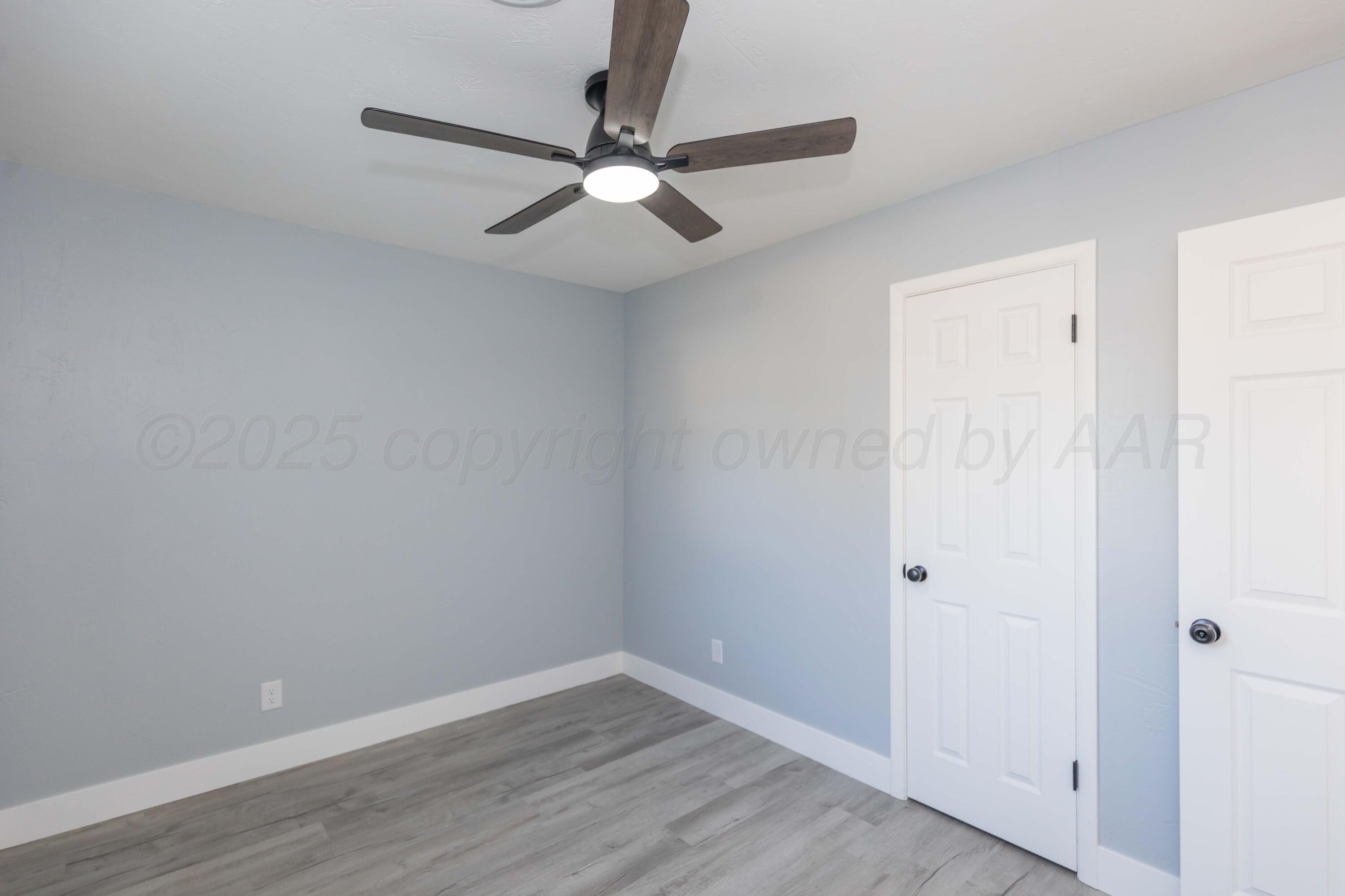 3108 Oak Drive Amarillo, TX 79107 - Photo 23 of 35 a view of a room with wooden floor