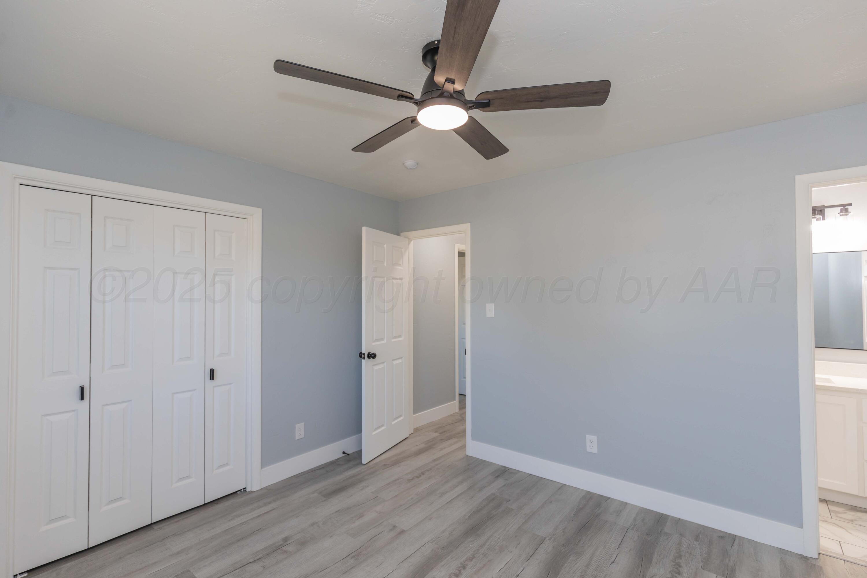 3108 Oak Drive Amarillo, TX 79107 - Photo 31 of 35 a view of an empty room with wooden floor