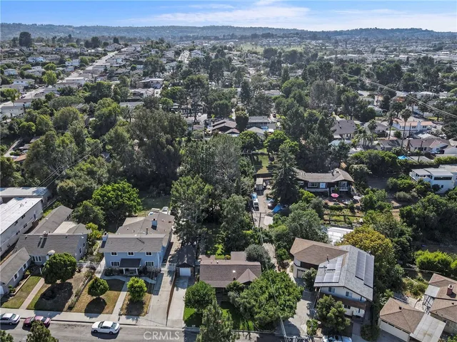 an aerial view of a city with lots of residential buildings