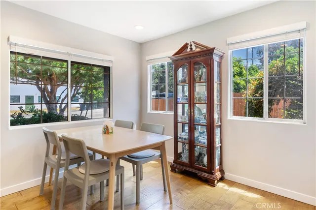 a view of a dining room with furniture window and outside view