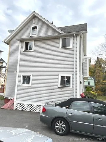a view of a house and a back side space of a house