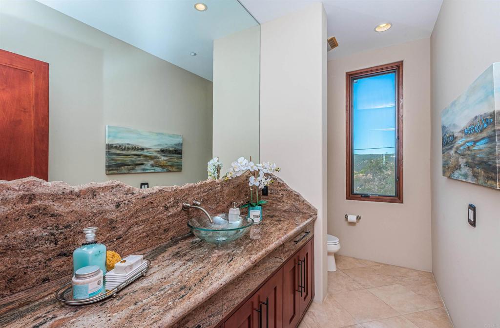 2362 Edgehill Road Vista, CA 92084 - Photo 32 of 63 a dining room with furniture and wooden floor