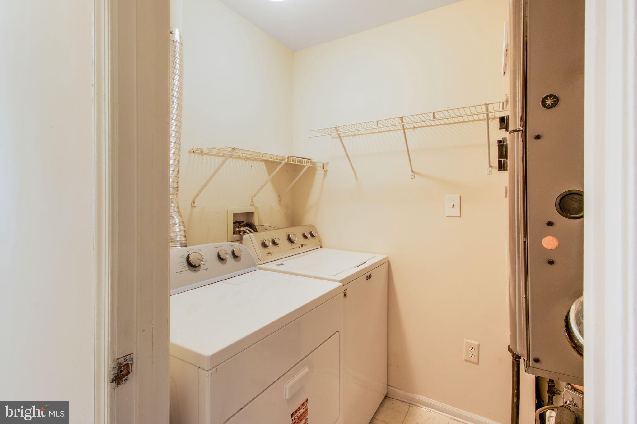5171 Duke Court Frederick, MD 21703 - Photo 12 of 26 a utility room with dryer and washer