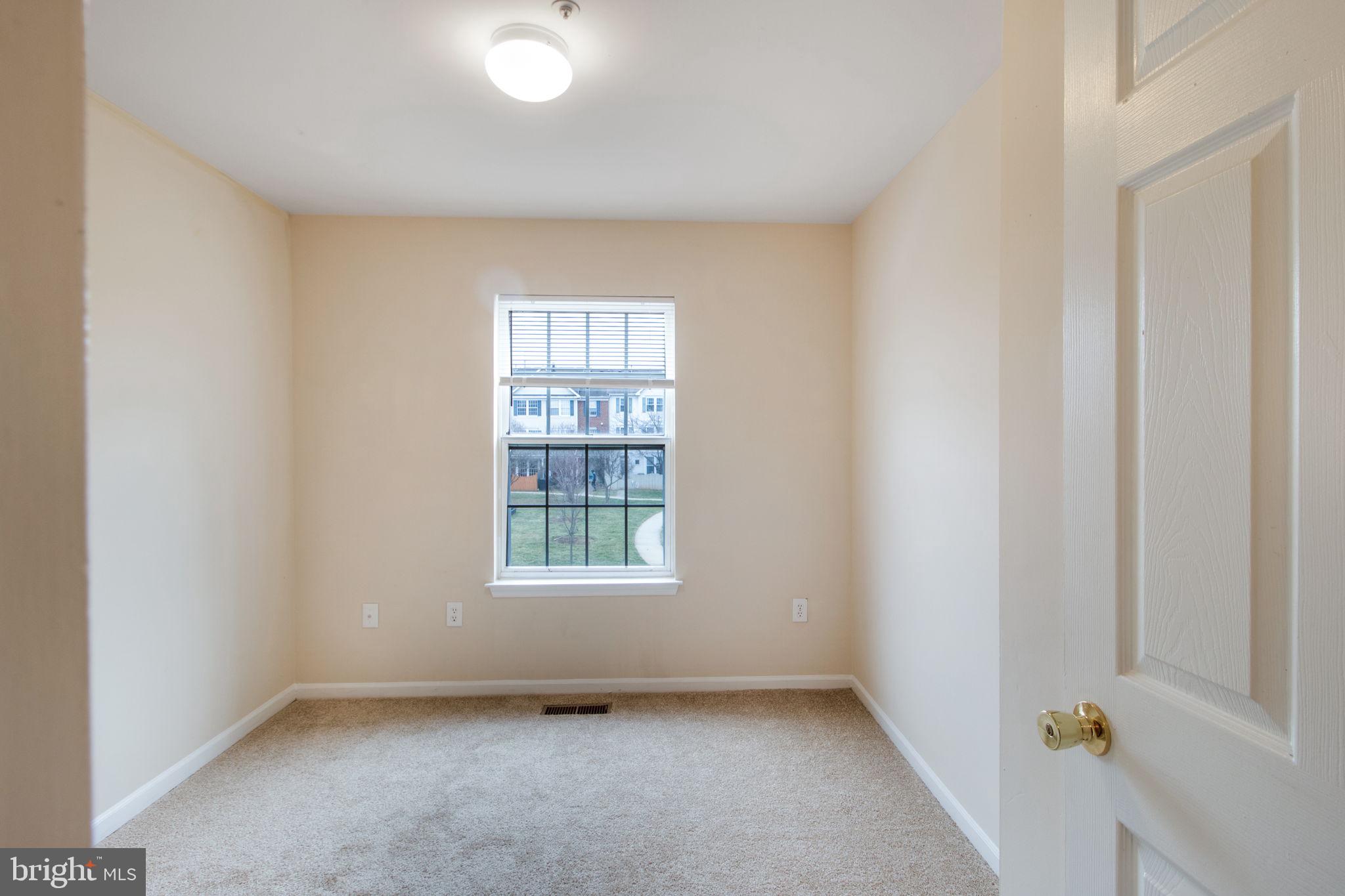 5171 Duke Court Frederick, MD 21703 - Photo 13 of 26 an empty room with a window