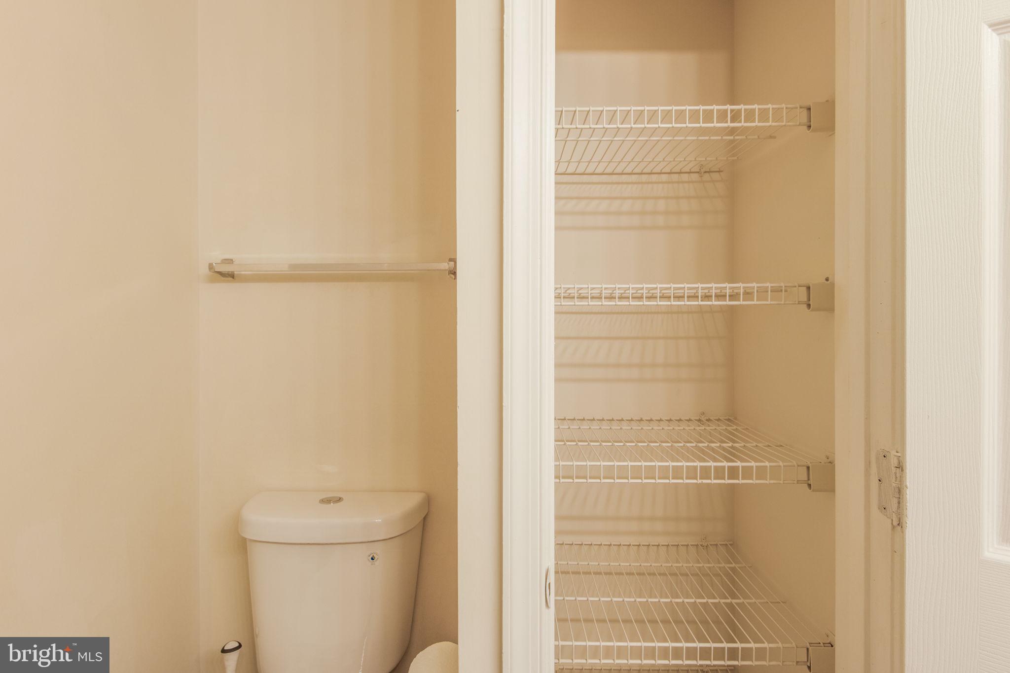 5171 Duke Court Frederick, MD 21703 - Photo 19 of 26 a bathroom with a shower and a toilet