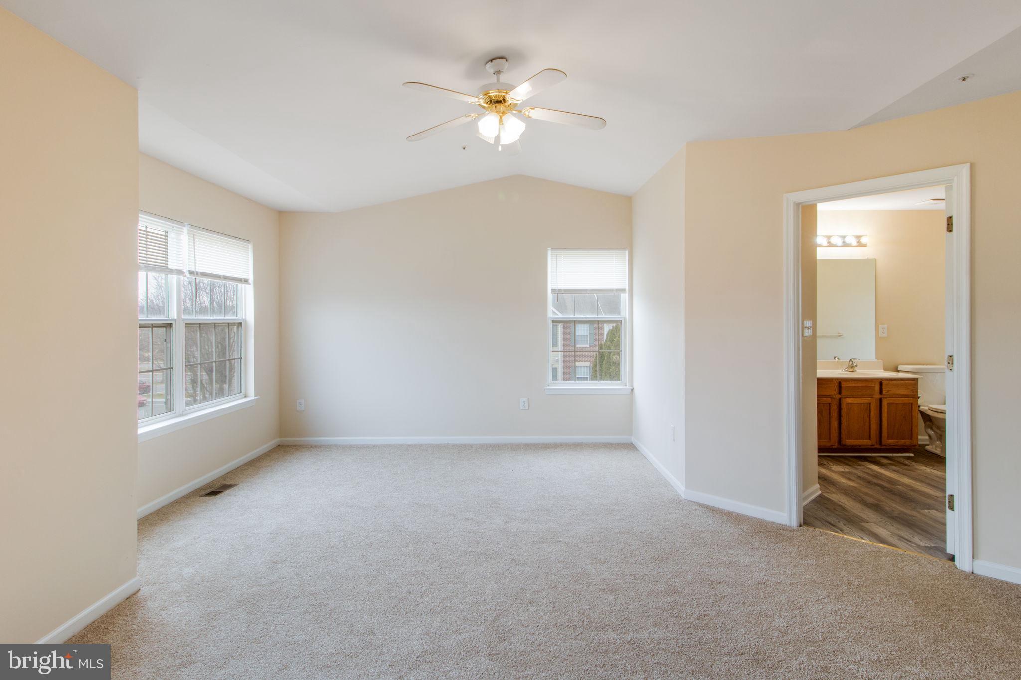 5171 Duke Court Frederick, MD 21703 - Photo 20 of 26 a view of an empty room with a window