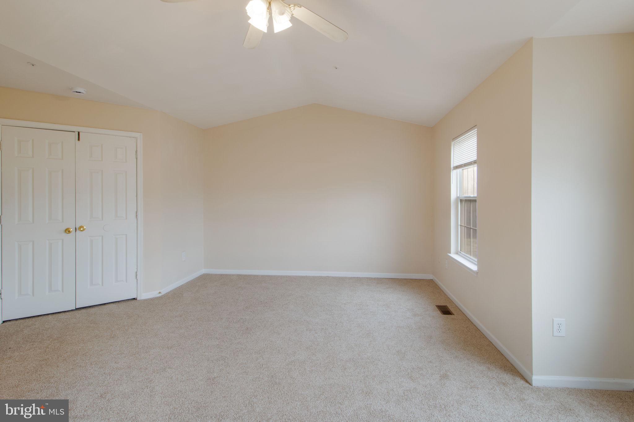 5171 Duke Court Frederick, MD 21703 - Photo 21 of 26 a view of an empty room with a window