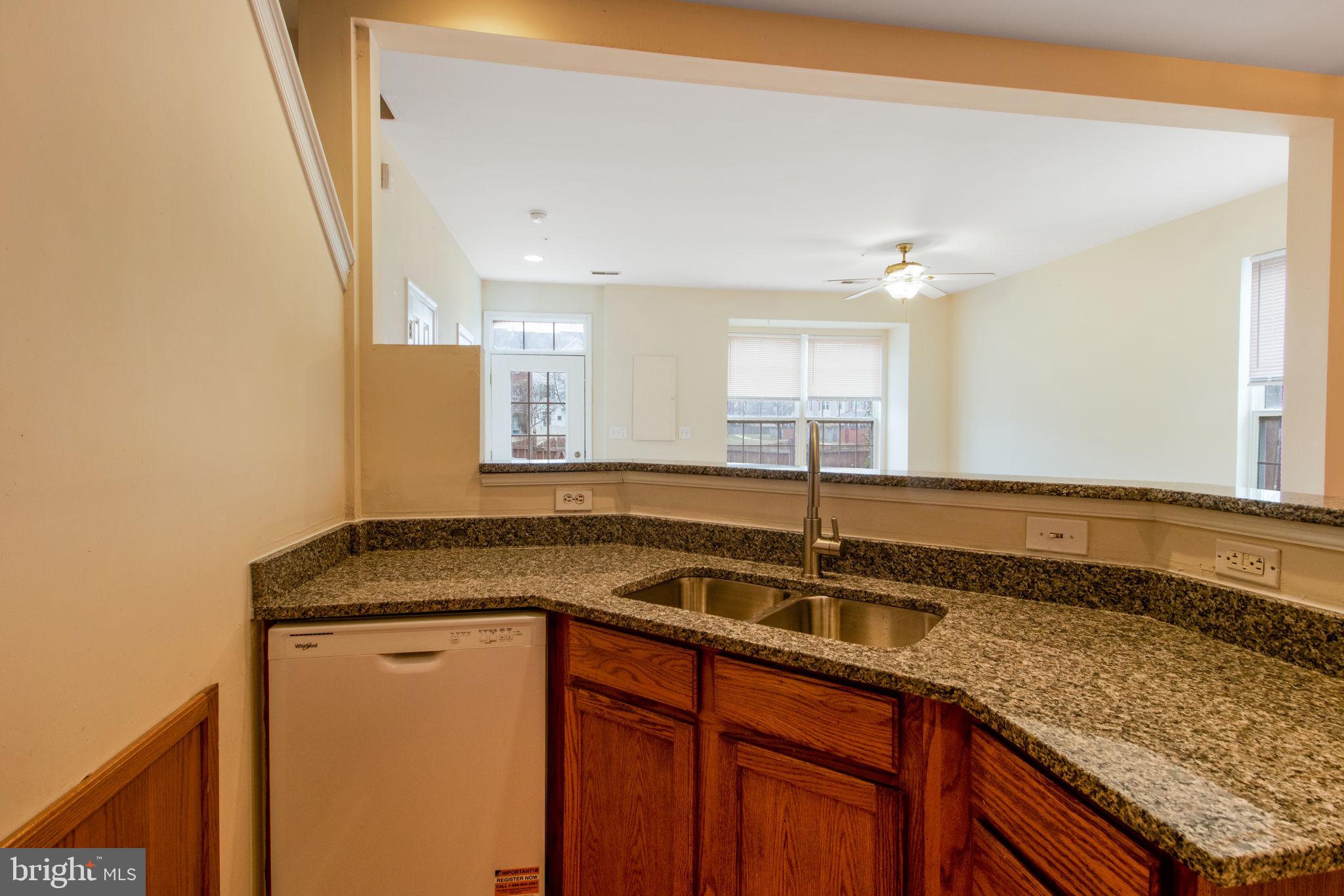 5171 Duke Court Frederick, MD 21703 - Photo 7 of 26 a kitchen with a sink and a window