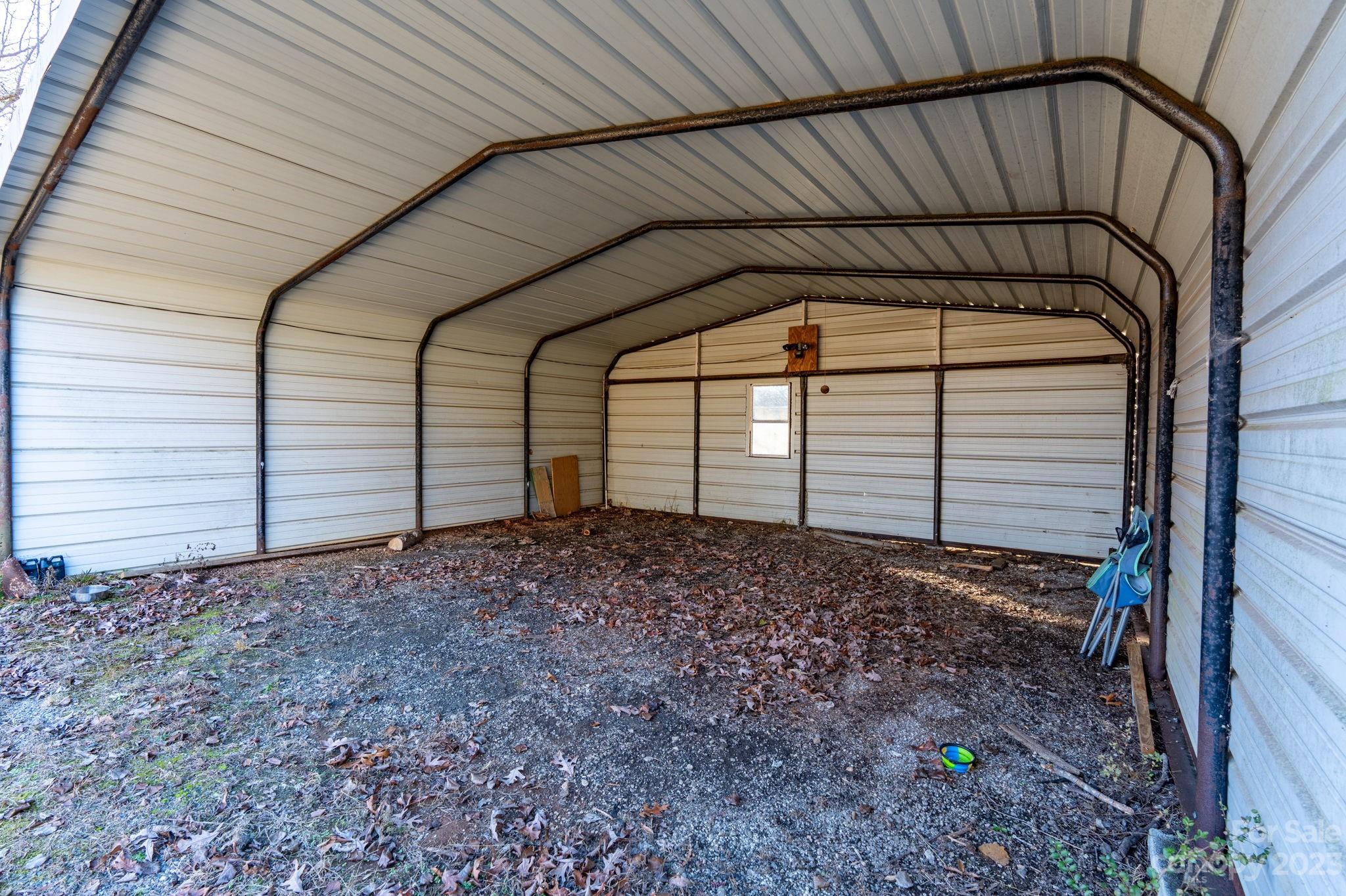 215 Cape Hickory Road Hickory, NC 28601 - Photo 15 of 34 a view of a house with a backyard