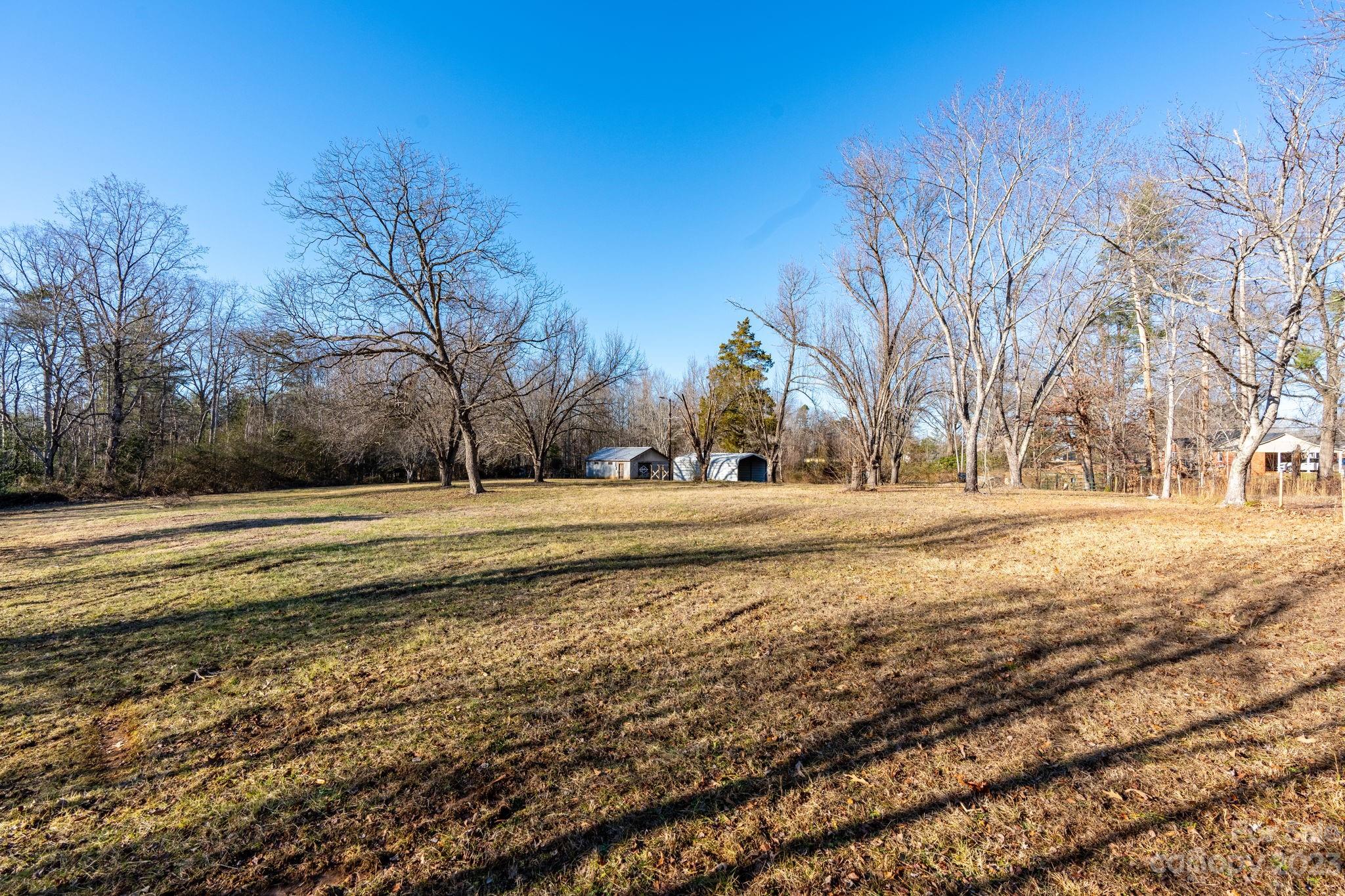 215 Cape Hickory Road Hickory, NC 28601 - Photo 26 of 34 a view of yard covered with snow in back
