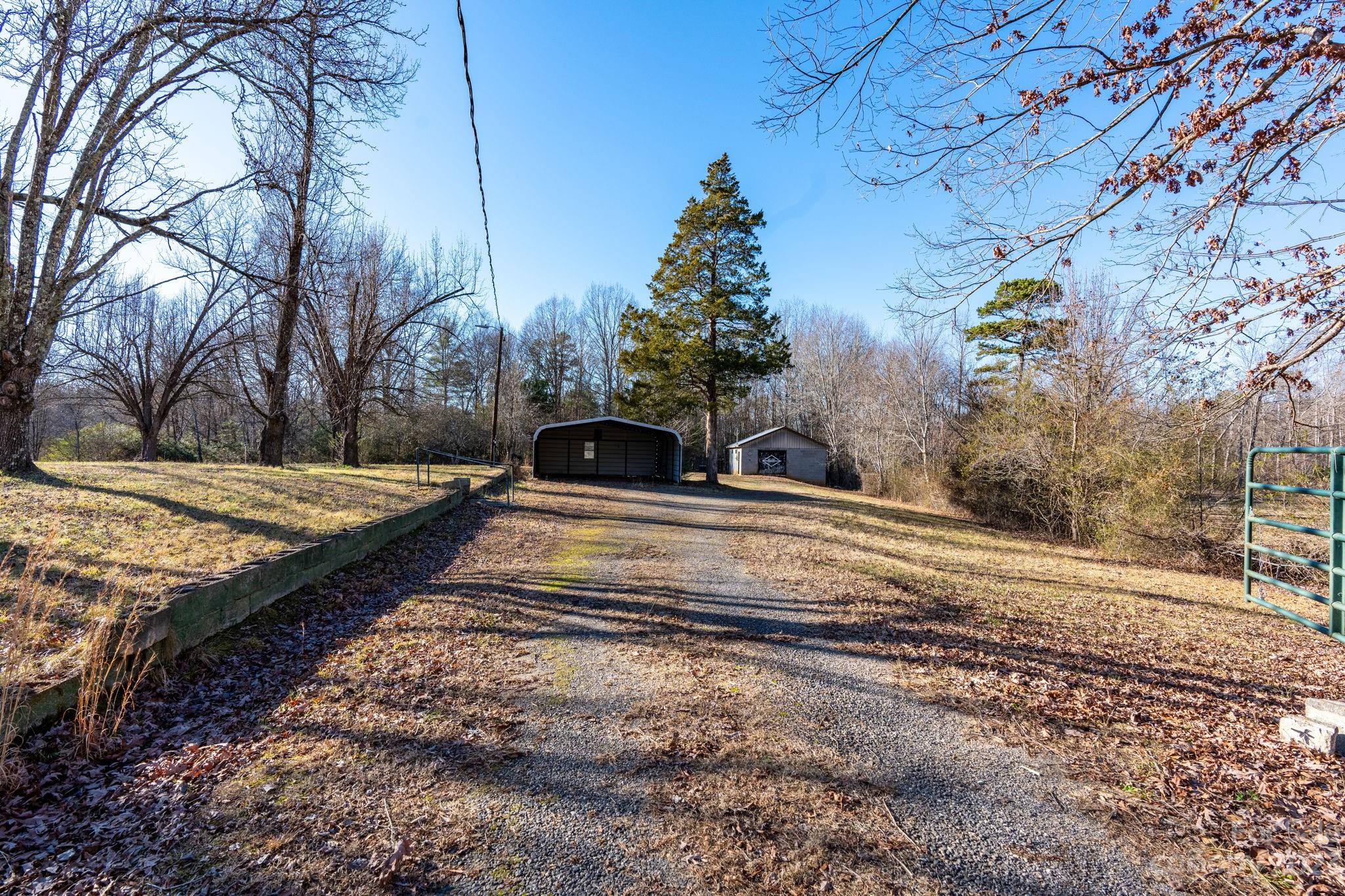 215 Cape Hickory Road Hickory, NC 28601 - Photo 4 of 34 a view of yard with large trees