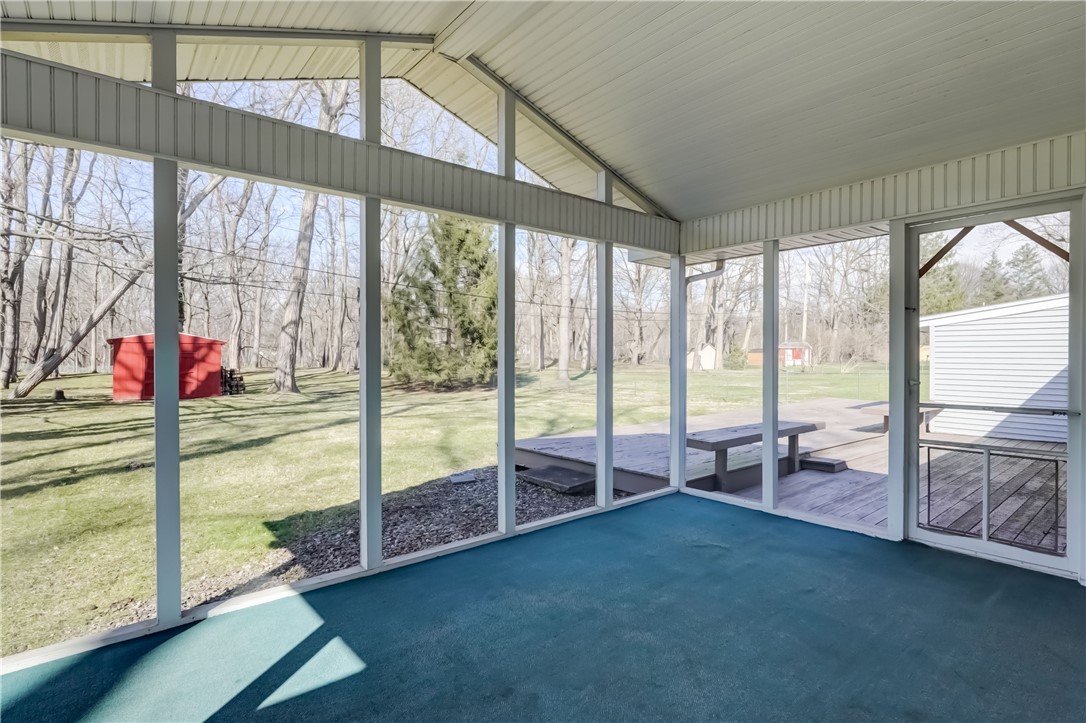 232 Ayrault Road Perinton, NY 14450 - Photo 18 of 36 Access the screened in porch from the sliding door