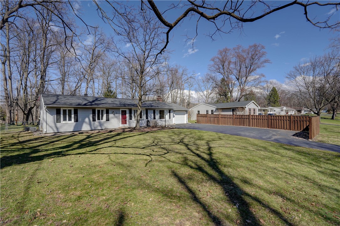 232 Ayrault Road Perinton, NY 14450 - Photo 3 of 36 Privacy fence around parking area.