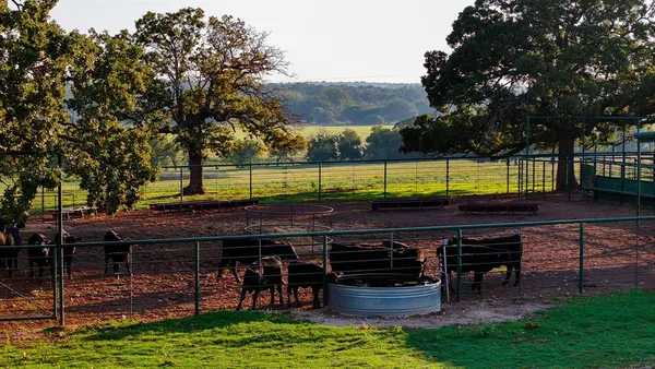 a view of a swimming pool with a patio