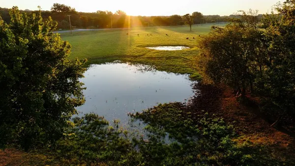 a view of lake and mountain
